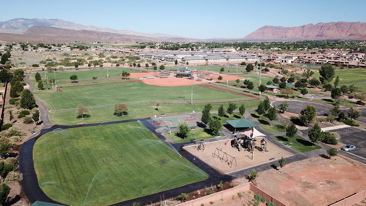 Aerial view of park with playground and softball complex