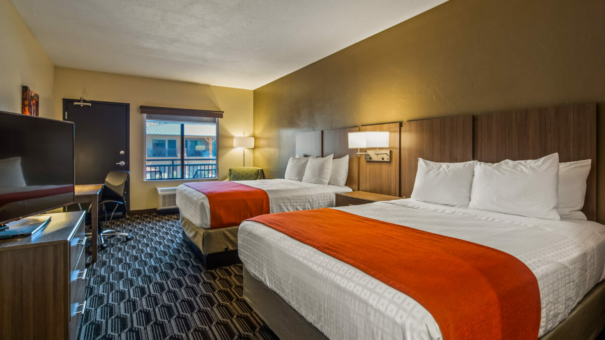Modern hotel room with two queen beds