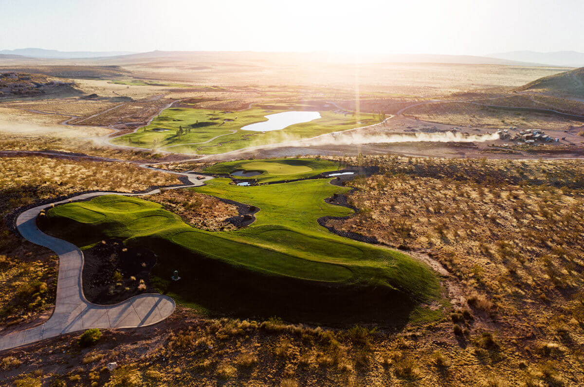 Aerial view of golf course at sunrise