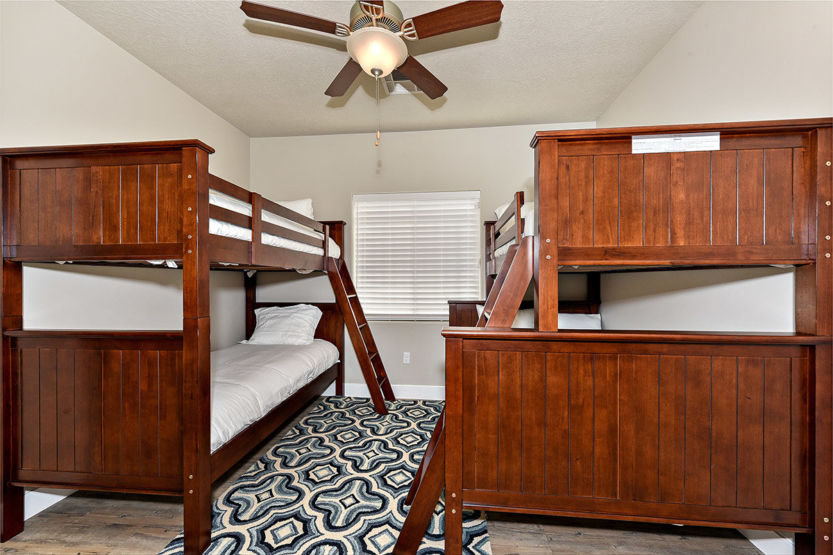 Hotel room with twin wooden bunk beds