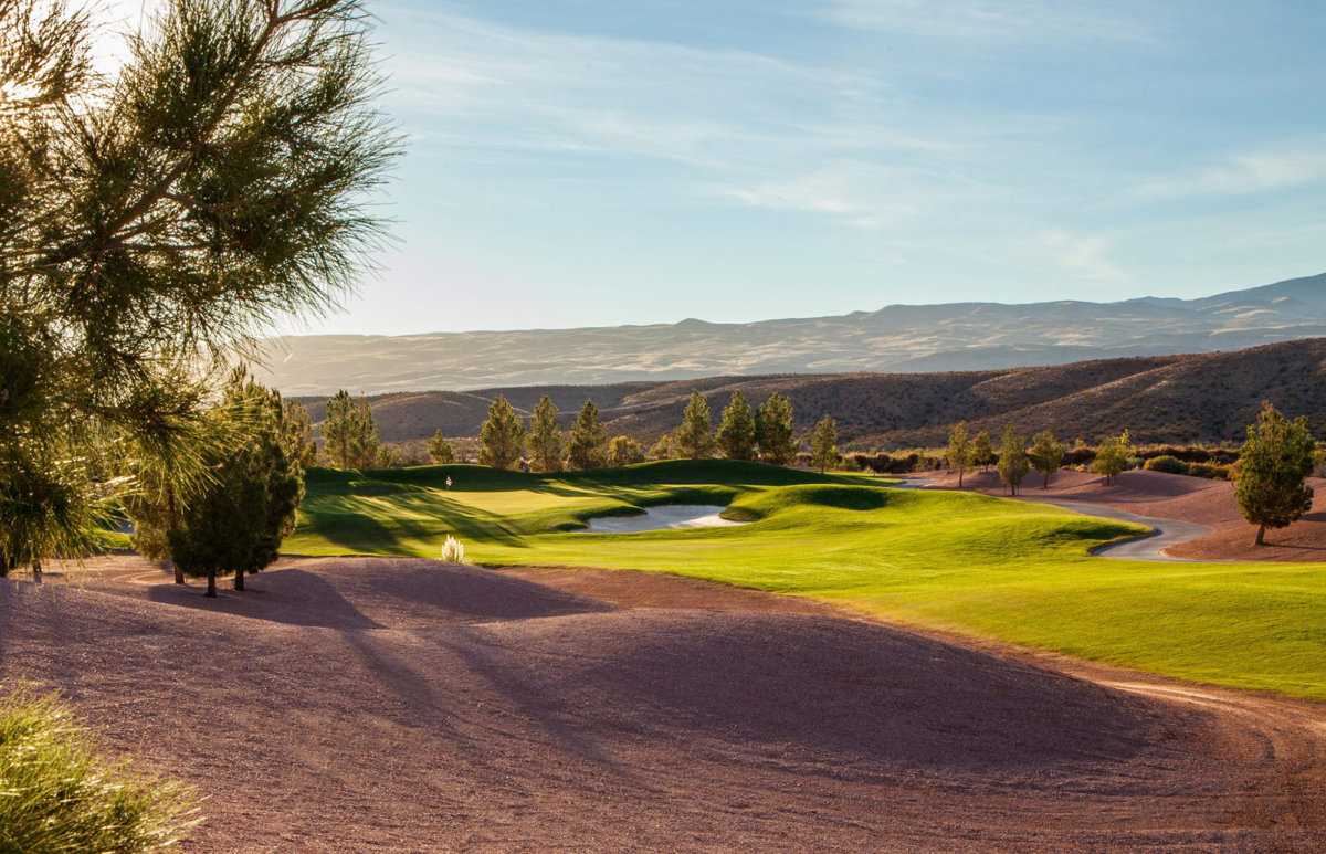 Sun rising over golf course