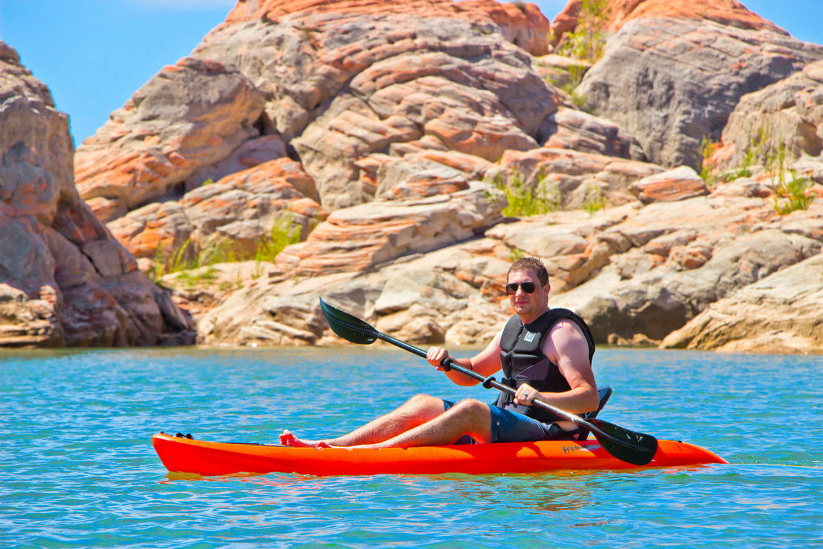 Man kayaking at Gunlock State Park