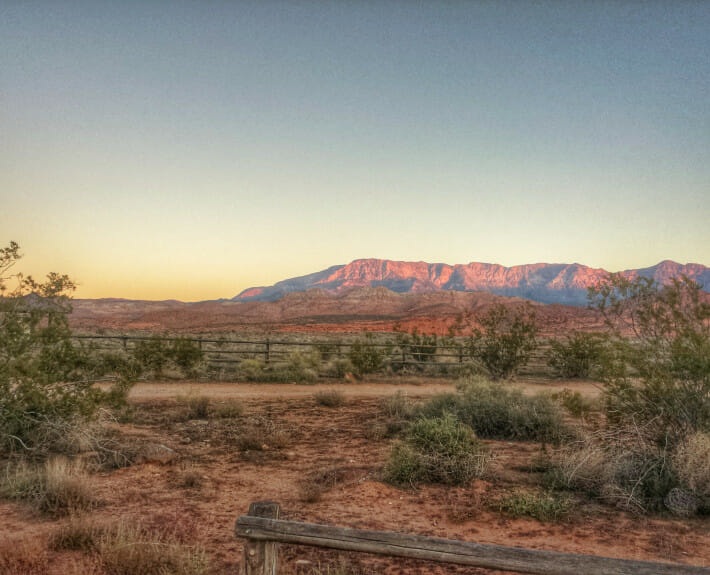 Desert trail with mountains in background.