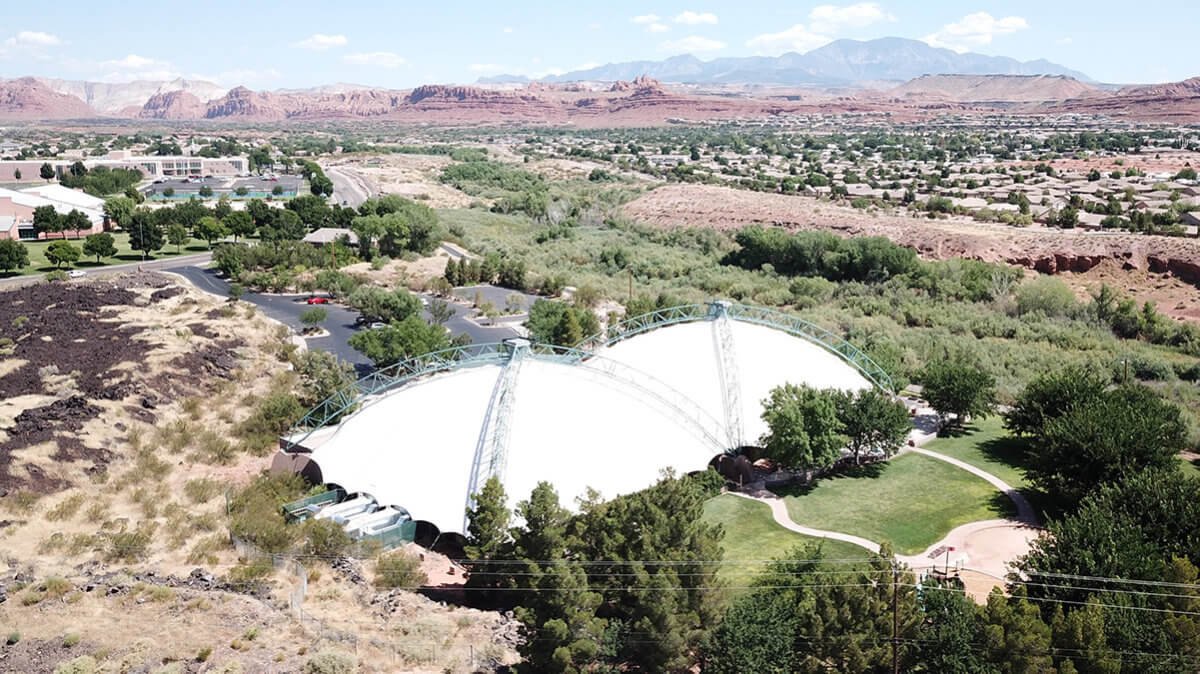 Aerial view of white tented building