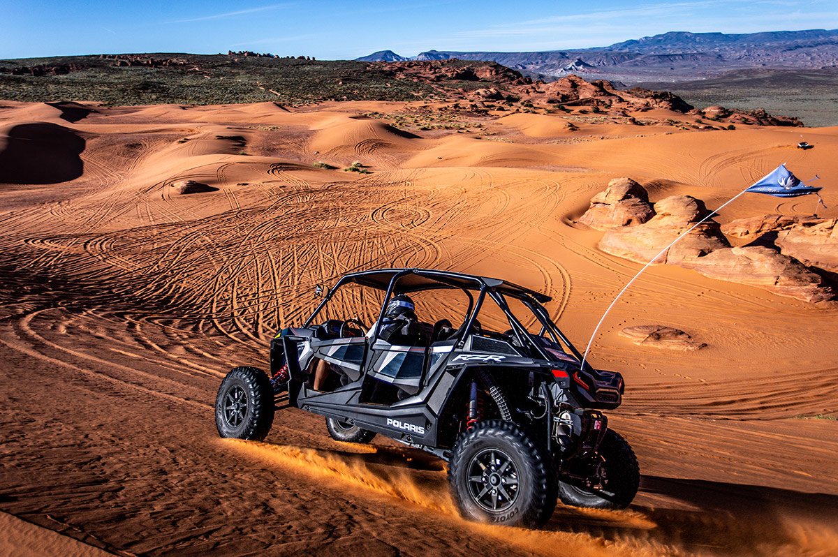UTV driving on sand dunes