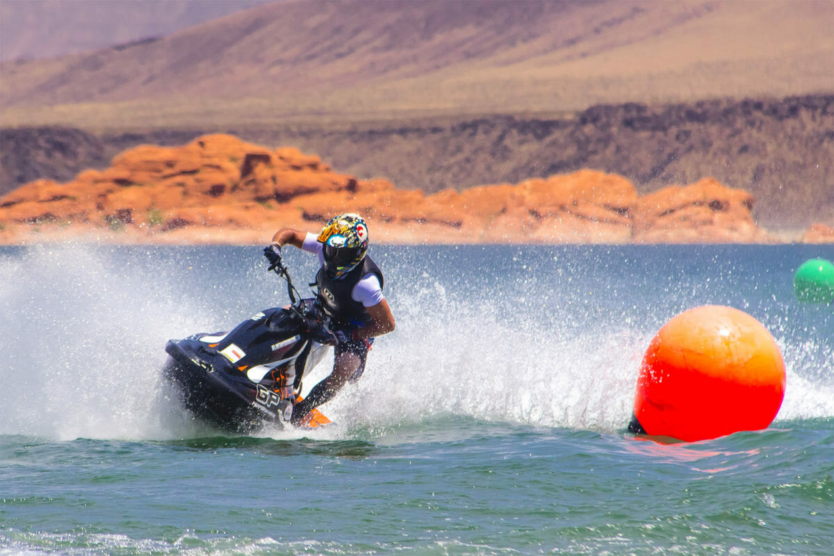 Watercross rider racing around buoy