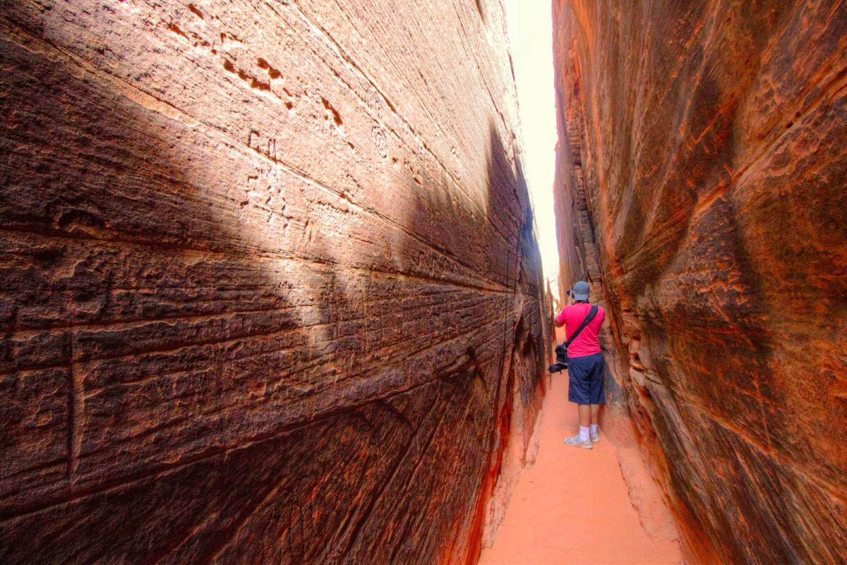 Ancient petroglyphs on slot canyon walls