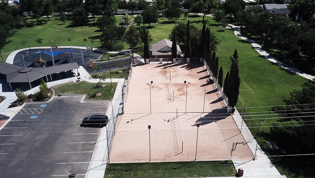 Aerial view of sand volleyball courts in city park