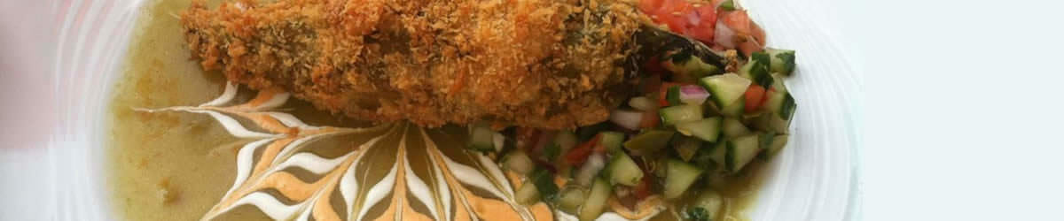 Plate with green sauce and cucumber salsa. Springdale Restaurant